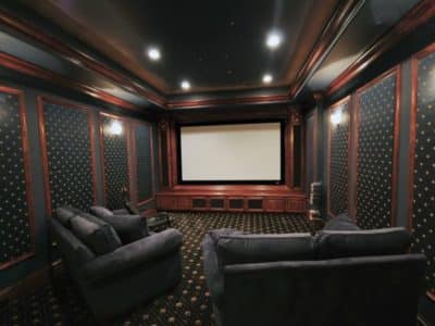This basement finishing was turned into a next level in home movie theater.