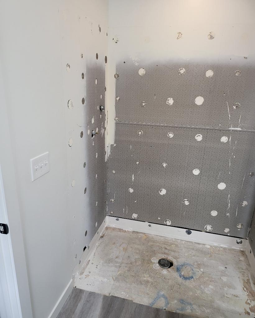Demo photos of a shower to tub conversion in Lehi, Utah.