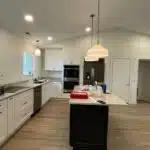Newly remodeled kitchen where Allied removed a wall and used garage space to expand the kitchen and did a full change out of flooring, cabinets and countertops