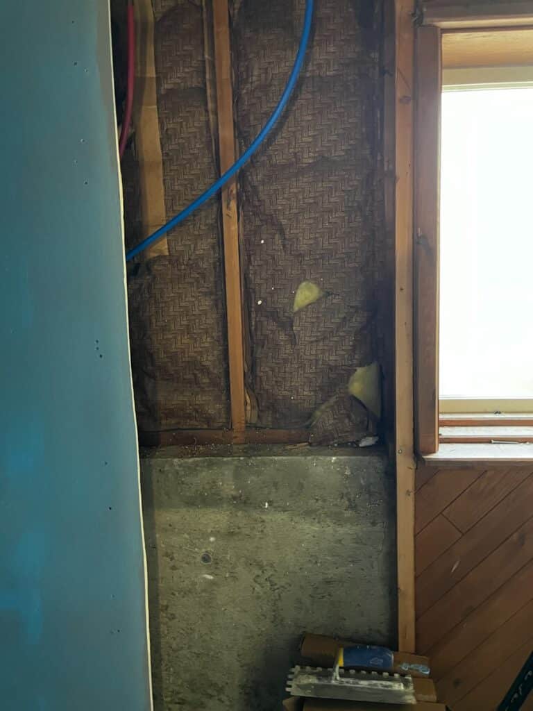 Installation in the wall after Allied Remodeling Contractors removed the old drywall. Now it's time to start of the new modern shower remodel. 