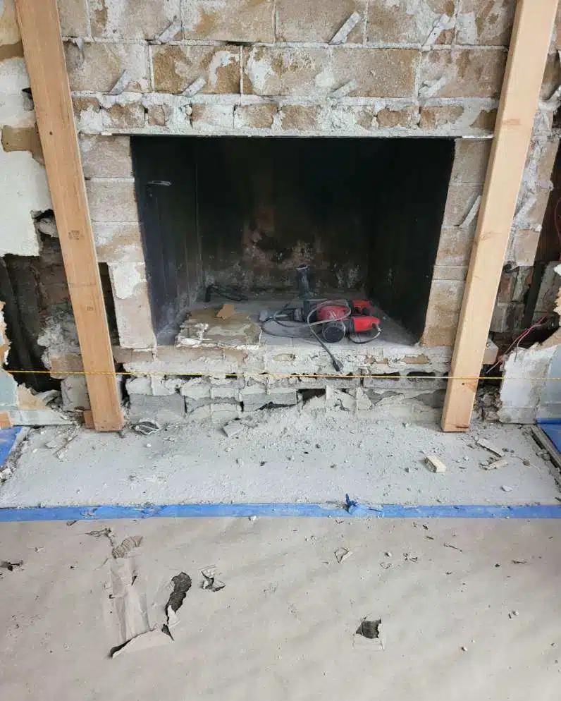 An in progress image of the removal of the old fire place. 