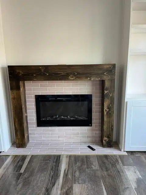Completed fireplace remodel by Allied Remodeling Contractors in Provo, Utah. 