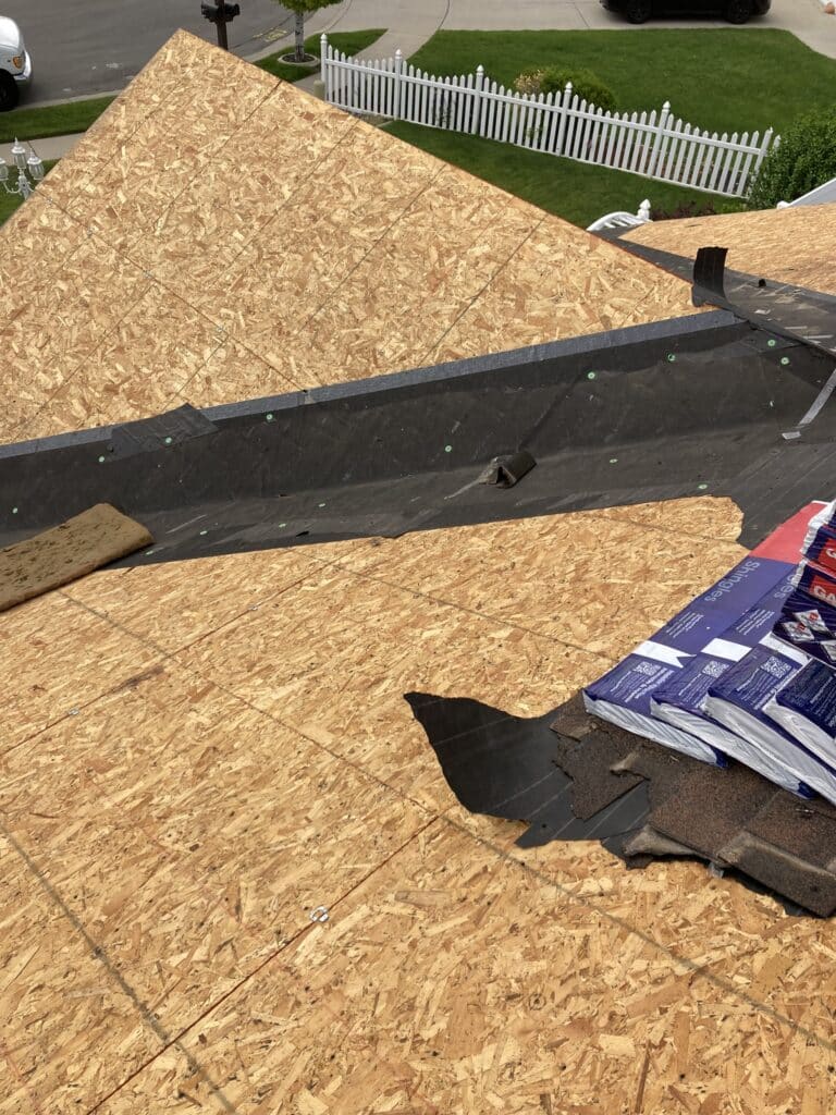 Our general contractor and roofer in Lehi, Utah getting all the underlayment ready to be applied to the freshly laid plywood. 