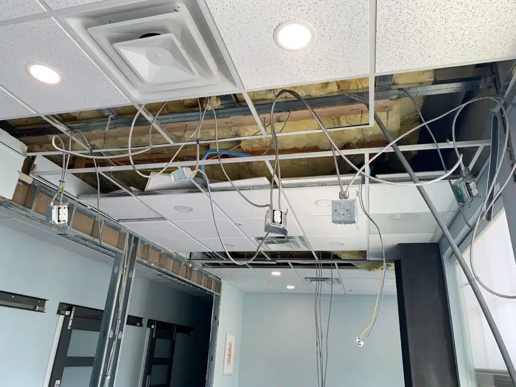 Electrical wiring is also being redirected during this commercial TI project in Orem, Utah. 