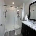 Remodeled bathroom to modify tub to walk-in ADA compliant shower
