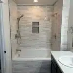 converted regular sized bathtub to king sized bathtub and did tile bath surround